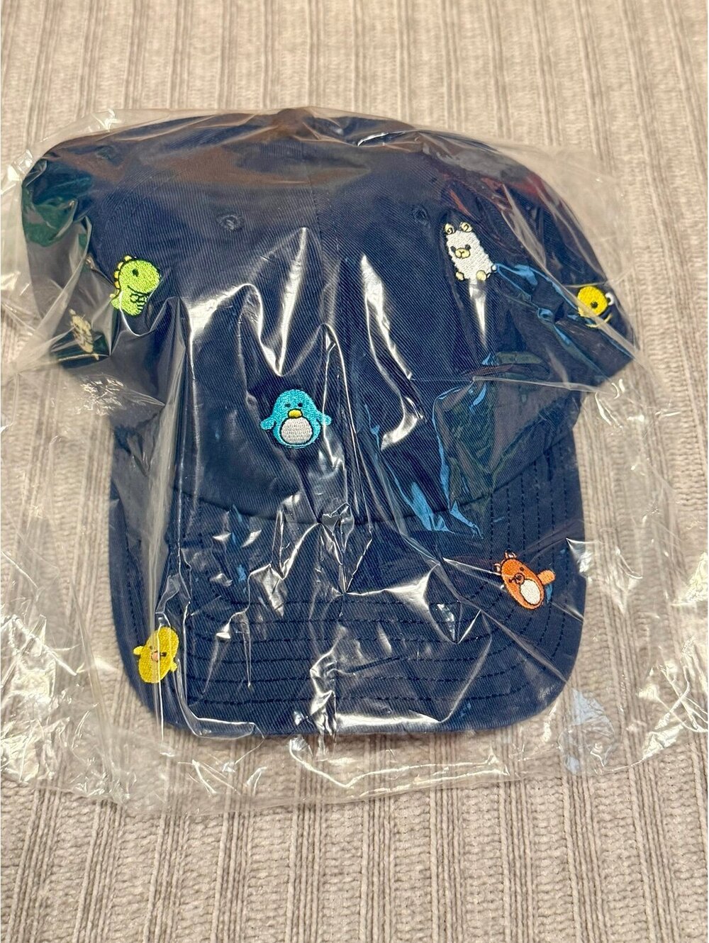 The Woobles navy blue character hat